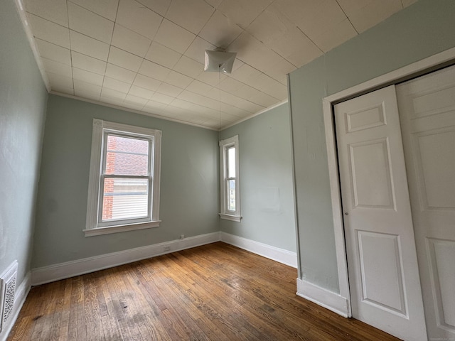 15 Eaton St, Hartford, CT 06114 - spare room featuring hardwood / wood-style floors, baseboards, and crown molding