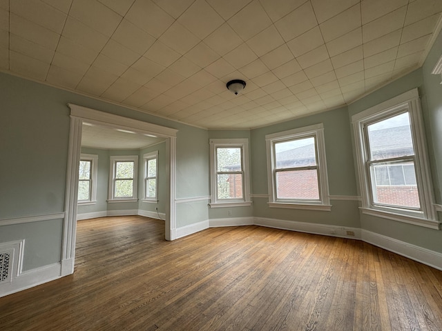 15 Eaton St, Hartford, CT 06114 - empty room featuring dark wood-style floors and baseboards