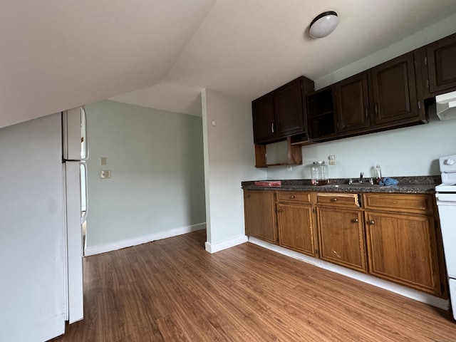15 Eaton St, Hartford, CT 06114 - kitchen with white appliances, a sink, dark wood-style floors, lofted ceiling, and open shelves