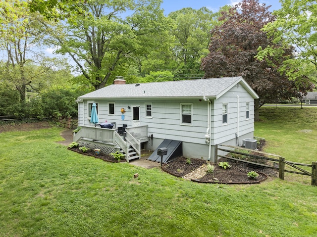 52 Pine Orchard Rd, Branford, CT 06405 - back of house featuring a deck, roof with shingles, a chimney, and view of scattered trees