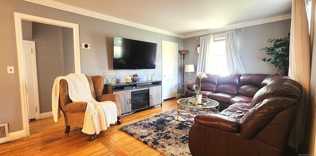 97 Waterbury Ave, Stamford, CT 06902 - living area with light wood finished floors, crown molding, and baseboards