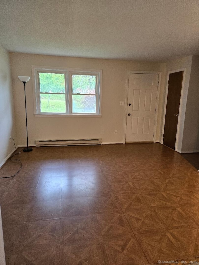 71 Arthur St Apt 2, Torrington, CT 06790 - spare room featuring a baseboard radiator and baseboards