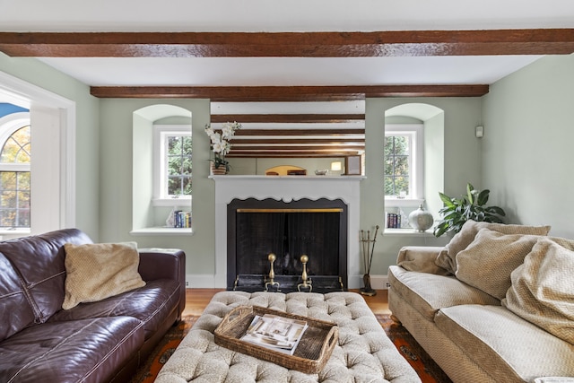 386 Bloomfield Ave, West Hartford, CT 06117 - living area featuring arched walkways, wood finished floors, and beam ceiling
