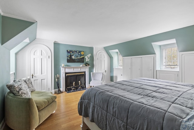 386 Bloomfield Ave, West Hartford, CT 06117 - bedroom with wood finished floors and a fireplace