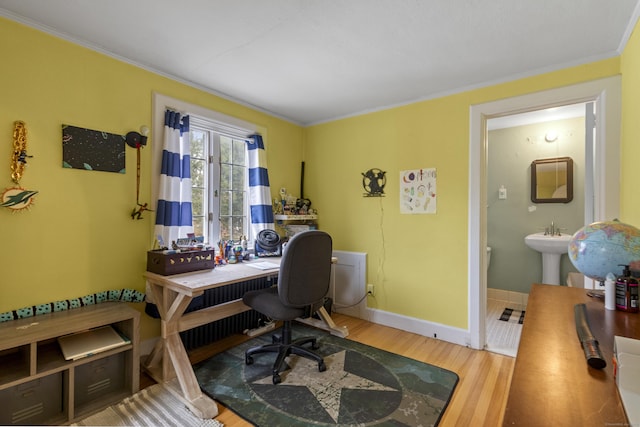386 Bloomfield Ave, West Hartford, CT 06117 - office with baseboards, crown molding, wood finished floors, and a sink