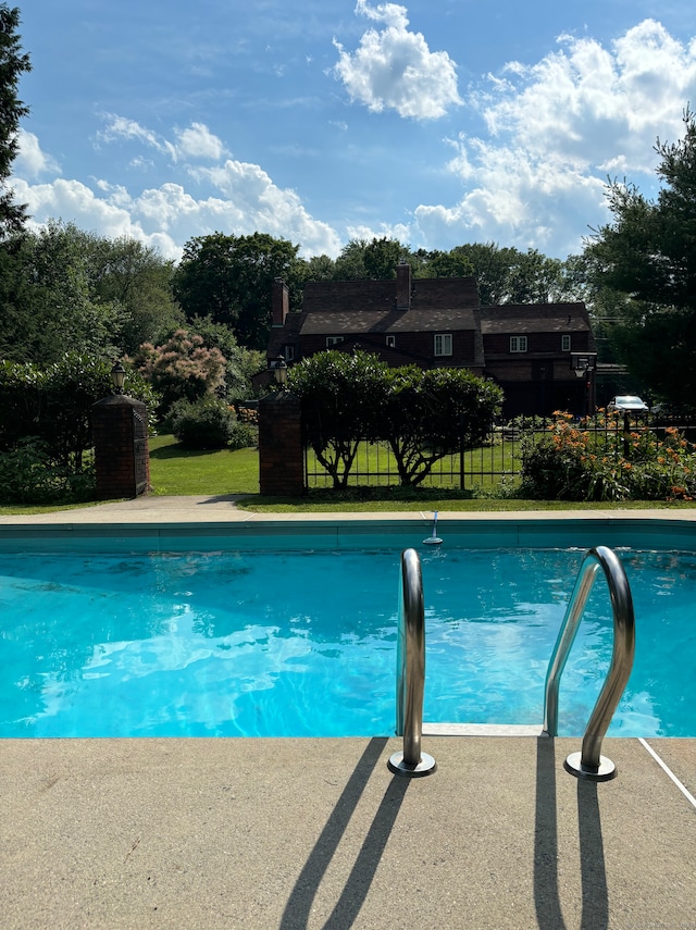 386 Bloomfield Ave, West Hartford, CT 06117 - view of pool with fence, a lawn, and a fenced in pool