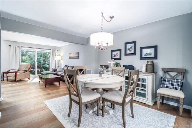 61 Wickhams Fancy Unit 61, Canton, CT 06019 - dining space with a chandelier and light wood-style flooring