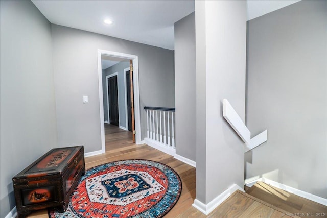 61 Wickhams Fancy Unit 61, Canton, CT 06019 - hallway featuring an upstairs landing, wood finished floors, baseboards, and recessed lighting