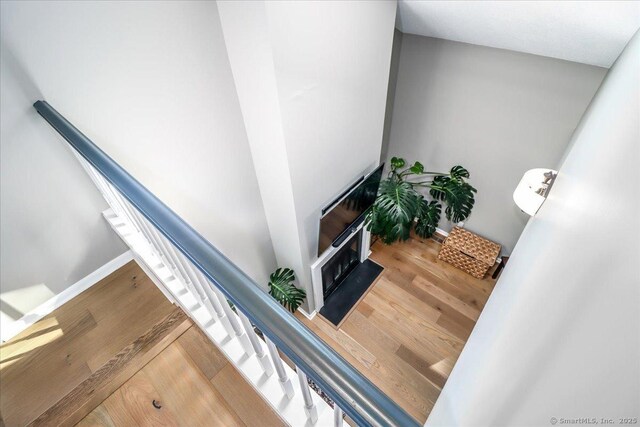 61 Wickhams Fancy Unit 61, Canton, CT 06019 - stairway with wood finished floors and baseboards