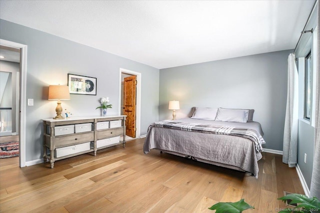 61 Wickhams Fancy Unit 61, Canton, CT 06019 - bedroom with light wood-style floors and baseboards