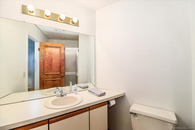 61 Wickhams Fancy Unit 61, Canton, CT 06019 - bathroom featuring toilet, vanity, and an enclosed shower