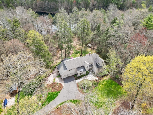 drone / aerial view with a forest view
