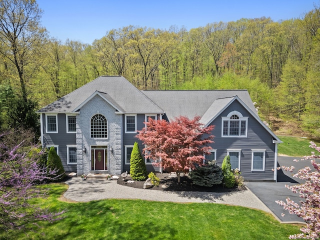 420 Winding Rdg, Southington, CT 06489 - view of front of home with a forest view and a front yard