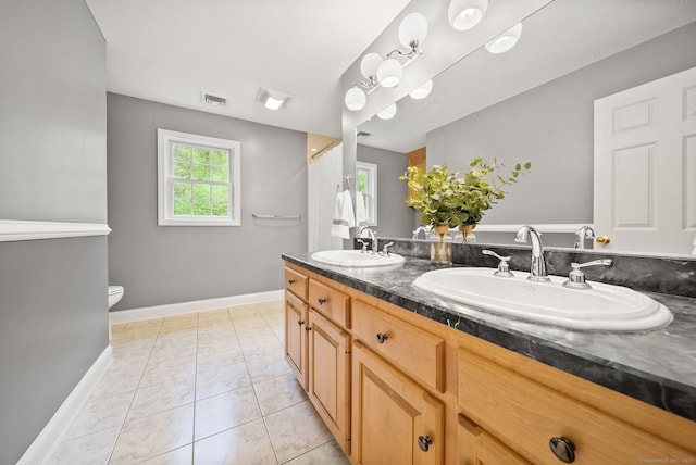 420 Winding Rdg, Southington, CT 06489 - bathroom with toilet, baseboards, and double vanity
