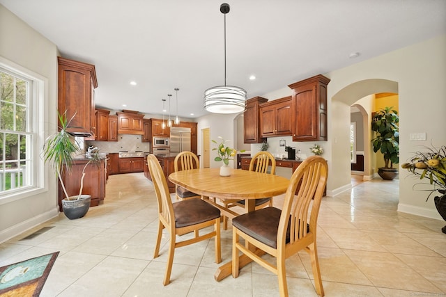 420 Winding Rdg, Southington, CT 06489 - dining area with recessed lighting, light tile patterned flooring, arched walkways, and baseboards