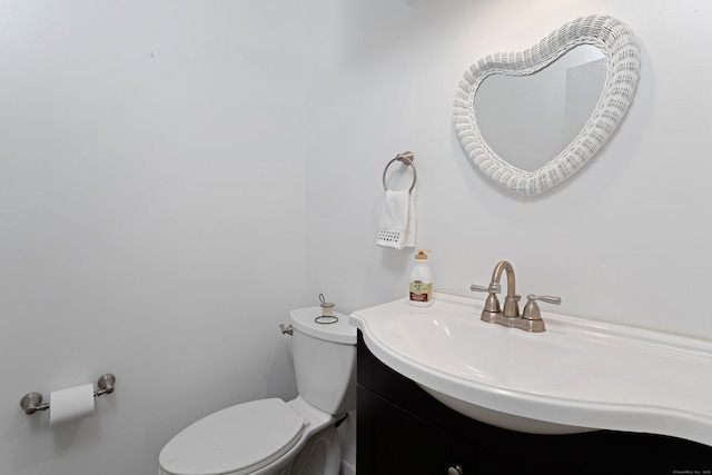 half bath with toilet and vanity