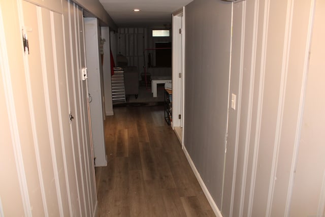 hall with dark wood-type flooring