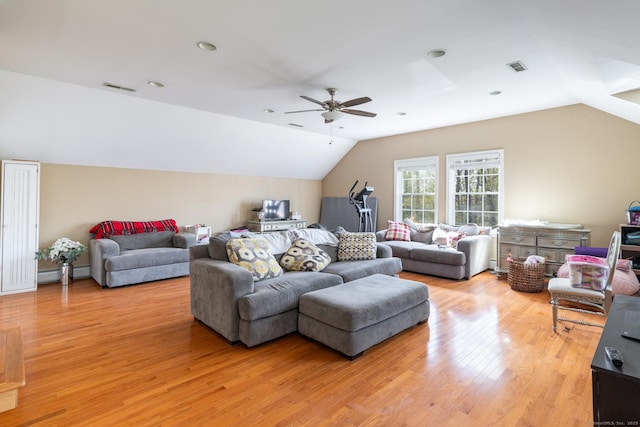 114 Cobbler Ln, Southbury, CT 06488 - living area featuring a ceiling fan, visible vents, a baseboard heating unit, light wood finished floors, and lofted ceiling
