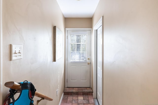114 Cobbler Ln, Southbury, CT 06488 - doorway featuring stone finish floor and baseboards