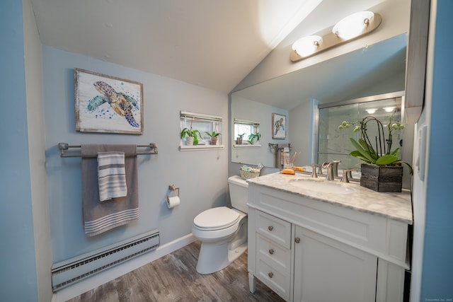 full bathroom featuring vanity, wood finished floors, toilet, baseboard heating, and a stall shower