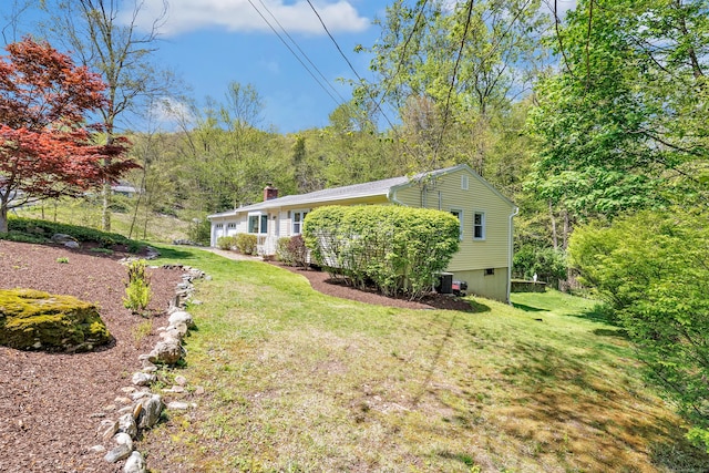 82 Village Dr, Shelton, CT 06484 - view of yard with an attached garage