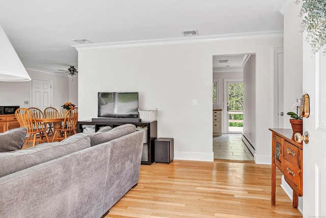 82 Village Dr, Shelton, CT 06484 - living area with visible vents, ornamental molding, baseboards, ceiling fan, and light wood-style flooring