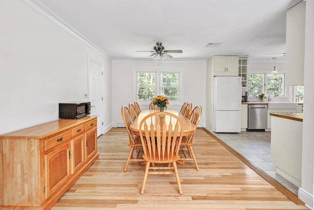 82 Village Dr, Shelton, CT 06484 - dining area with a ceiling fan, plenty of natural light, and light wood-type flooring