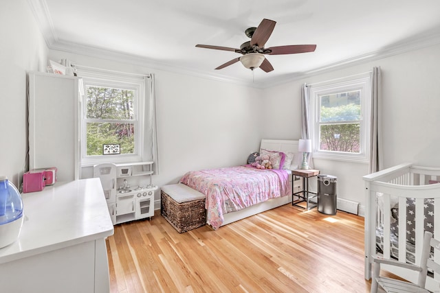 82 Village Dr, Shelton, CT 06484 - bedroom with crown molding, ceiling fan, multiple windows, and light wood finished floors