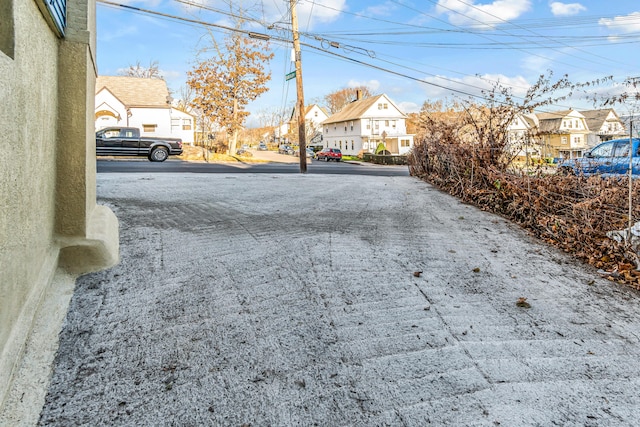 view of road with a residential view
