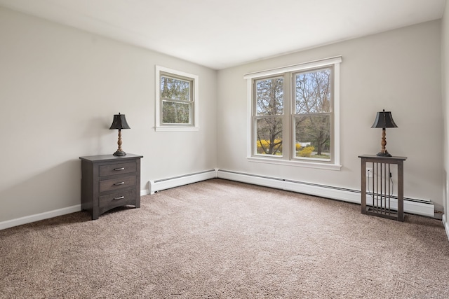 interior space with baseboards and baseboard heating