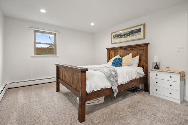 bedroom featuring recessed lighting, carpet flooring, and a baseboard radiator