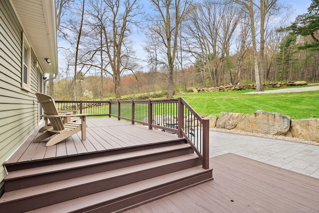 deck featuring a yard