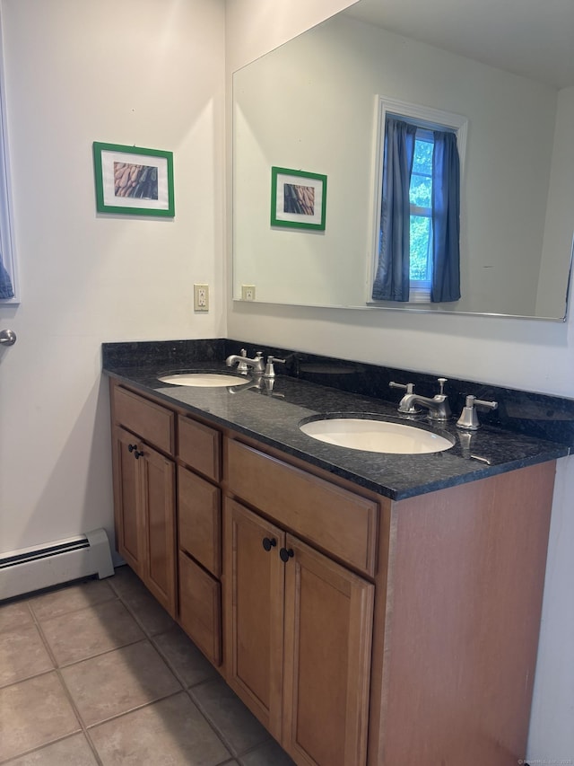 14 N Washington Ave, East Lyme, CT 06357 - full bathroom with double vanity, a baseboard heating unit, and tile patterned flooring