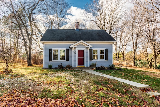 48 Jerusalem Hl, Trumbull, CT 06611 - new england style home with a chimney, roof with shingles, and a front lawn