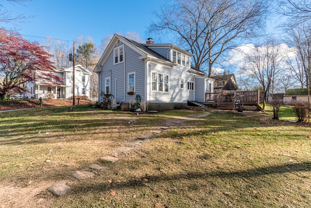 48 Jerusalem Hl, Trumbull, CT 06611 - view of property exterior with a lawn, a chimney, and a deck