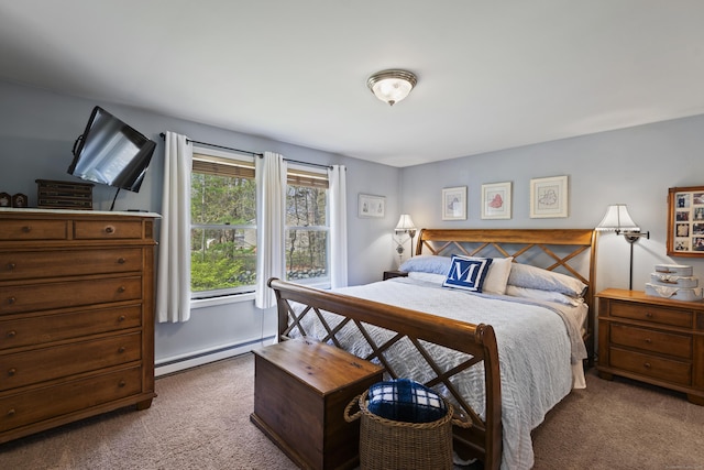 bedroom with carpet floors and a baseboard radiator