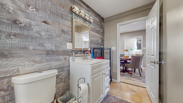 bathroom with toilet and vanity