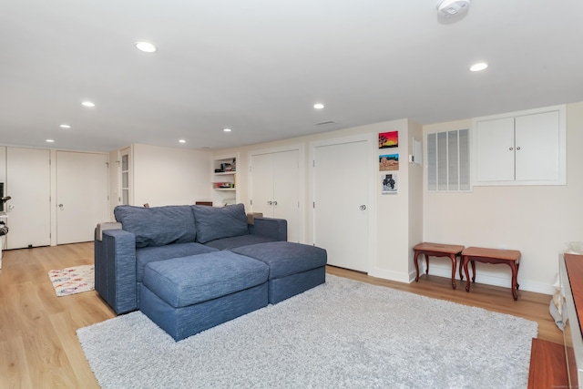 60 Eleanor Ter, Fairfield, CT 06824 - living room featuring light wood finished floors, recessed lighting, and baseboards