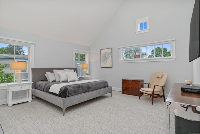 60 Eleanor Ter, Fairfield, CT 06824 - bedroom featuring high vaulted ceiling, multiple windows, baseboards, and carpet floors