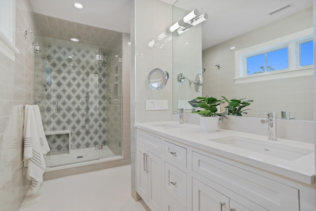 60 Eleanor Ter, Fairfield, CT 06824 - full bath with a stall shower, double vanity, and recessed lighting