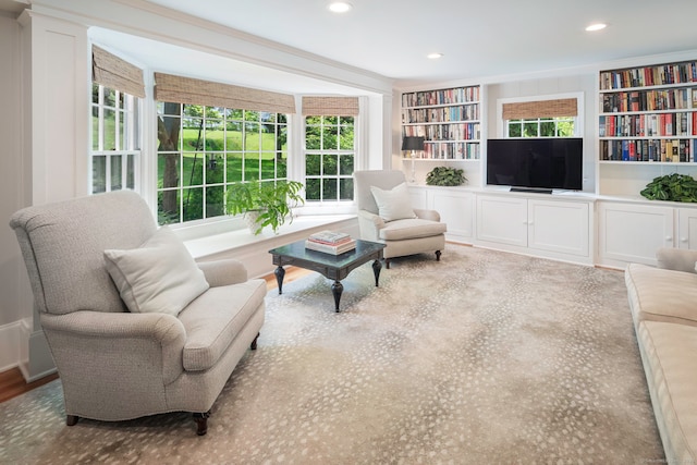 sitting room featuring recessed lighting and built in features