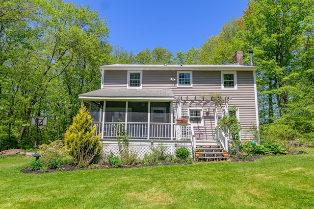 104 Pulpit Rock Rd, Woodstock, CT 06281 - view of front of house with a pergola, a front lawn, a sunroom, and a chimney