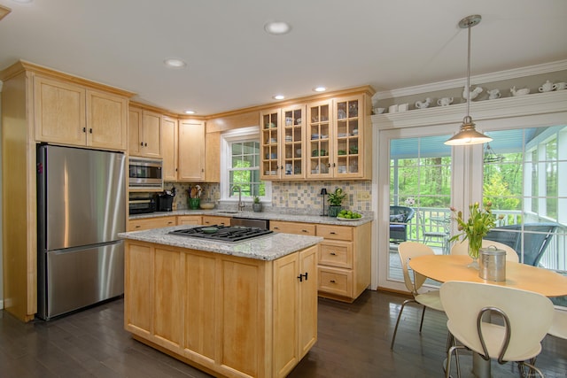 104 Pulpit Rock Rd, Woodstock, CT 06281 - kitchen featuring appliances with stainless steel finishes, light brown cabinets, dark wood-style flooring, backsplash, and crown molding