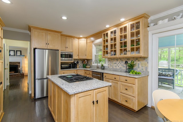104 Pulpit Rock Rd, Woodstock, CT 06281 - kitchen with stainless steel appliances, light brown cabinets, ornamental molding, dark wood finished floors, and backsplash