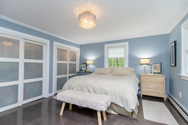 104 Pulpit Rock Rd, Woodstock, CT 06281 - bedroom featuring a baseboard radiator, dark wood-style floors, ornamental molding, and a chandelier