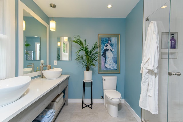 104 Pulpit Rock Rd, Woodstock, CT 06281 - bathroom featuring double vanity, tiled shower, tile patterned flooring, and recessed lighting