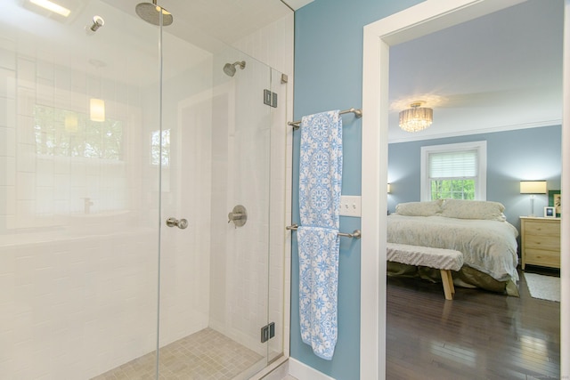 104 Pulpit Rock Rd, Woodstock, CT 06281 - ensuite bathroom with a shower stall and wood finished floors