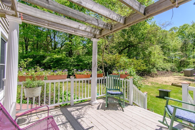104 Pulpit Rock Rd, Woodstock, CT 06281 - wooden deck with a lawn and view of wooded area