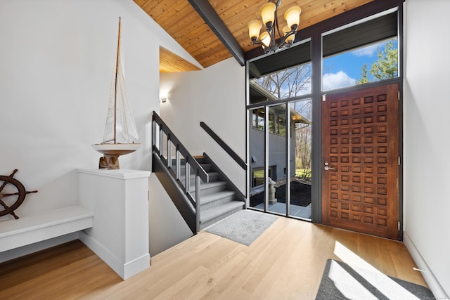 187 Sherbrook Dr, Goshen, CT 06756 - foyer entrance with wooden ceiling, stairway, wood finished floors, and a chandelier