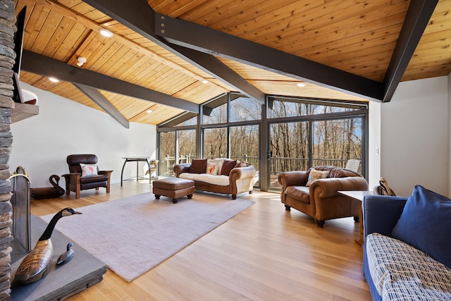 187 Sherbrook Dr, Goshen, CT 06756 - living area featuring wooden ceiling, vaulted ceiling with beams, a wealth of natural light, and wood finished floors